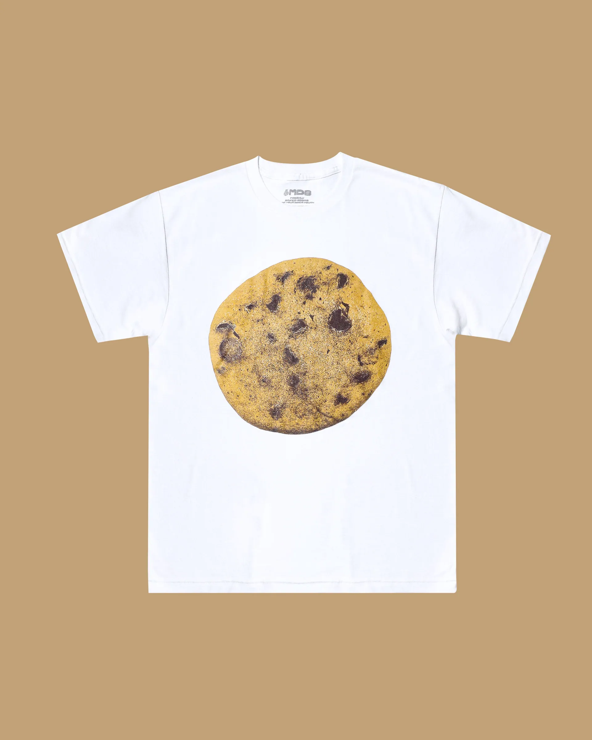 The Big Cookie Tee in white, a single cookie printed at chest width with the abbreviated mark at the neck.